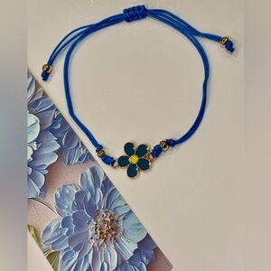 Dual Purposed Blue Floral Cord Bracelet with Gold Accent and a Matching Bookmark